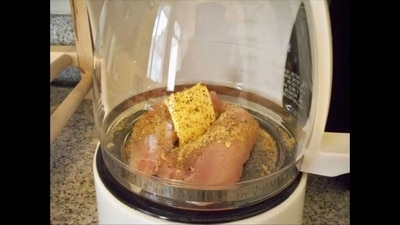 The image shows chicken getting cooked in the coffee machine. (LinkedIn/Alexander C.) The image shows chicken getting cooked in the coffee machine. (LinkedIn/Alexander C.)