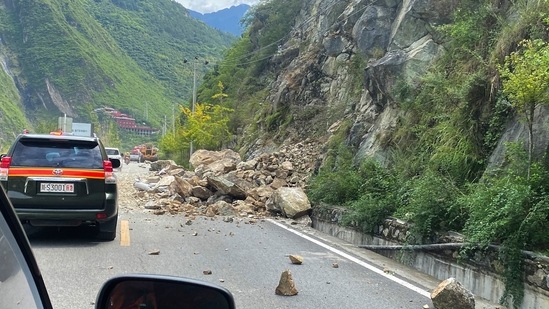 China Sichuan Earthquake: Fallen rocks are seen on road heading to Luding county in China.(AP)