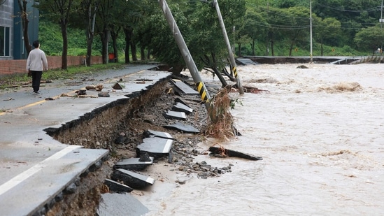 South Korea Super Typhoon Hinnamnor: A man walks along a damaged road in Gyeongju.(AFP)