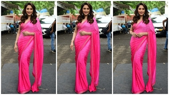 Madhuri Dixit earlier donned a pink georgette saree which she teamed with a shimmery blouse to the sets of Jhalak Dikhhla Jaa. (HT Photo/Varinder Chawla)