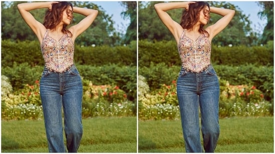 On Monday, Sharvari Wagh dropped new pictures from a photoshoot on Instagram. The Bunty Aur Babli 2 actor captioned the post, "Mindset like the sunset." The sunkissed photos show her dressed in a multi-coloured corset top and denim jeans. It is from the shelves of designer Tamanna Punjabi Kapoor's eponymous label.(Instagram)