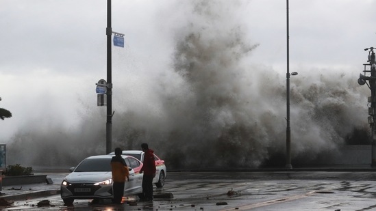 South Korea Super Typhoon Hinnamnor: Waves crash over the breakwater in Busan, South Korea.