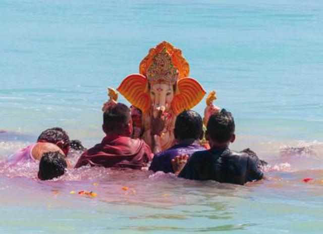 A Ganpati immersion in Mauritius, where the people hold on to traditions that their ancestors brought with them A Ganpati immersion in Mauritius, where the people hold on to traditions that their ancestors brought with them