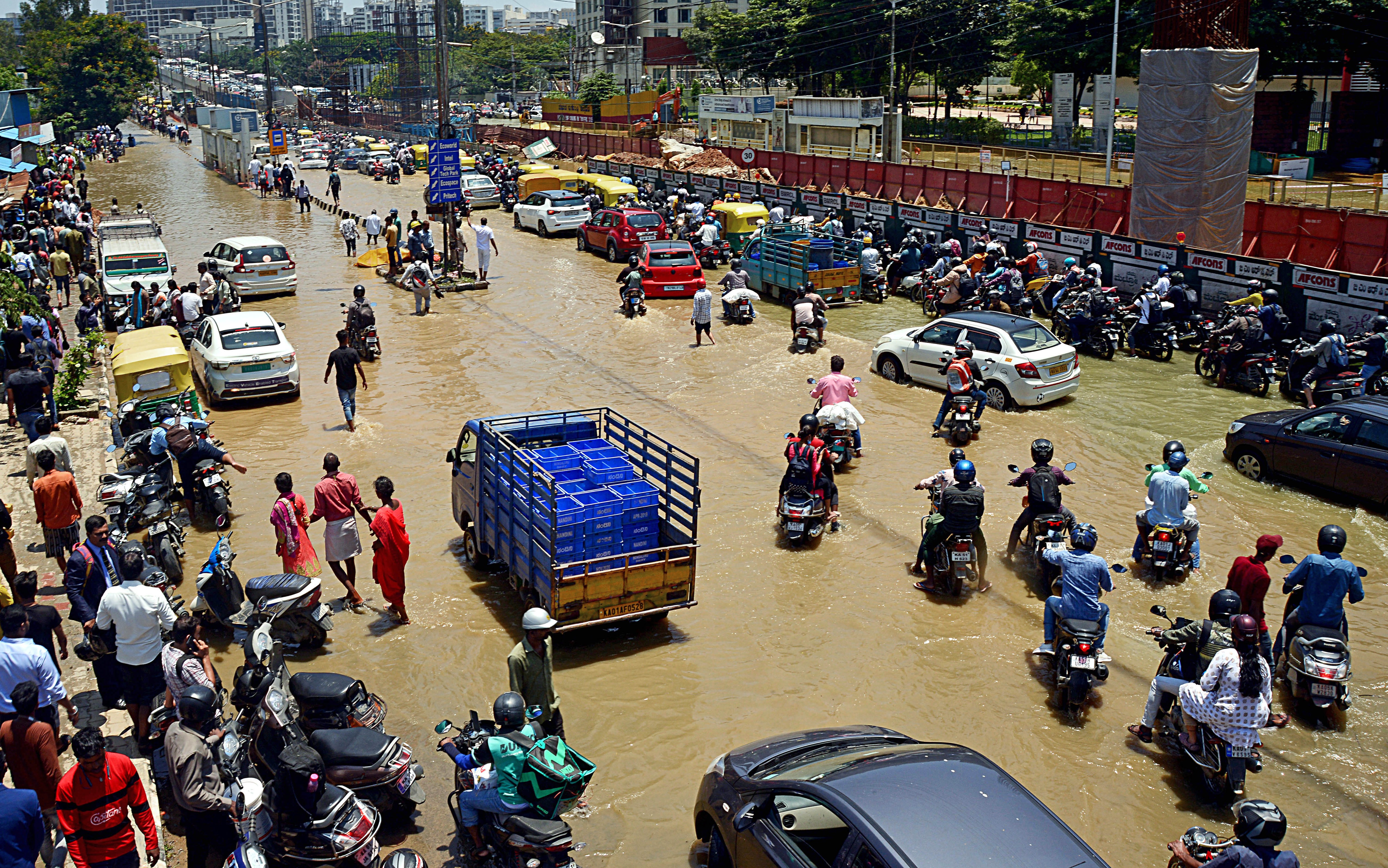 Bengaluru city was brought to its knees as it grappled with heavy rain for the second day. (ANI) Bengaluru city was brought to its knees as it grappled with heavy rain for the second day. (ANI)