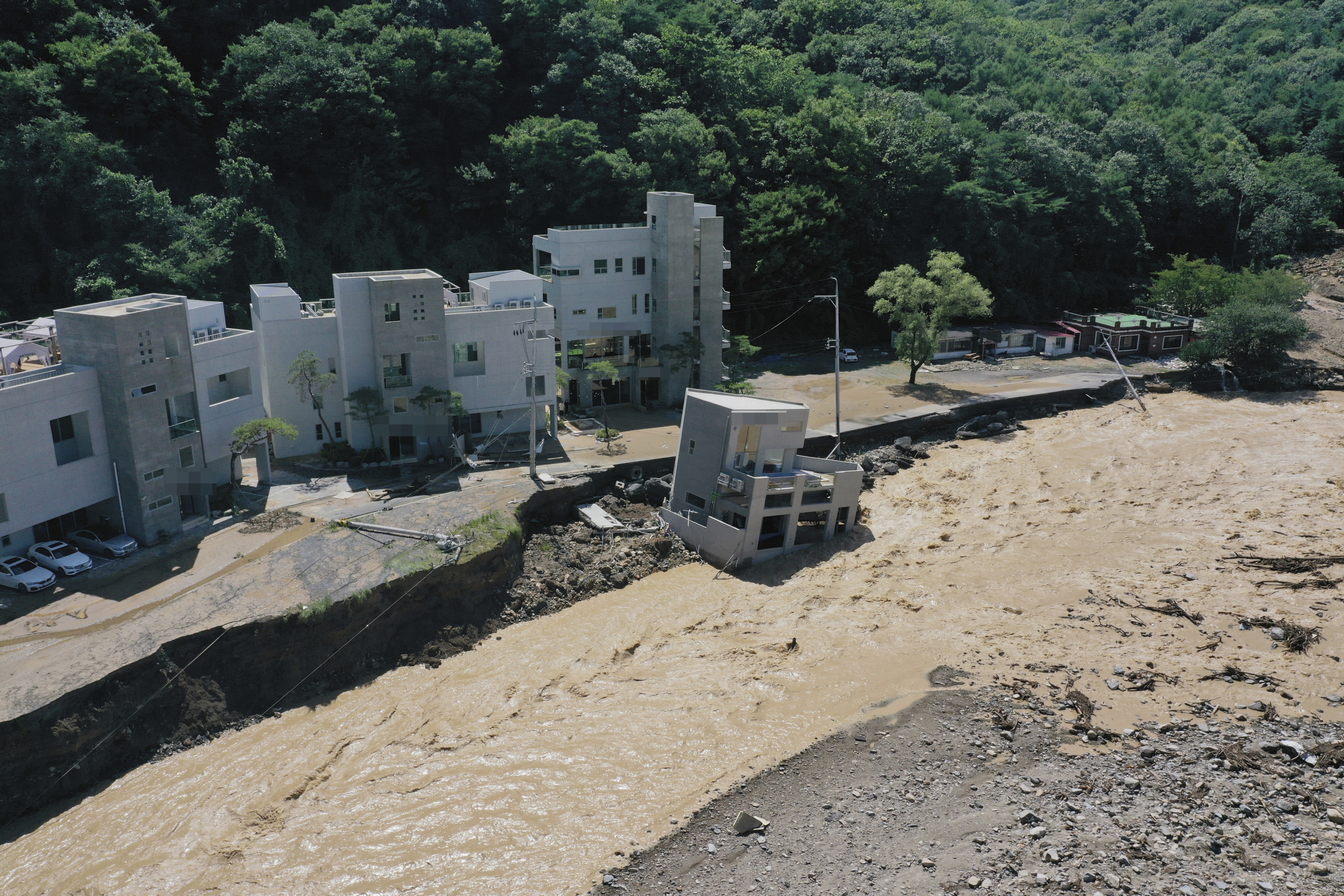 South Korea Super Typhoon Hinnamnor: A building is swept down in the aftermath of Typhoon Hinnamnor. (AP) South Korea Super Typhoon Hinnamnor: A building is swept down in the aftermath of Typhoon Hinnamnor. (AP)