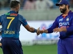 India's captain Rohit Sharma shake hands with Sri Lanka's captain Dasun Shanaka to congratulate him after Sri Lanka won the match (AP) India's captain Rohit Sharma shake hands with Sri Lanka's captain Dasun Shanaka to congratulate him after Sri Lanka won the match (AP)