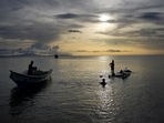 A fisherman suffered a gunshot to his ear in Kochi. (AP) A fisherman suffered a gunshot to his ear in Kochi. (AP)