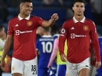 Manchester United's Casemiro, left, and Cristiano Ronaldo leave the pitch after the English Premier League match between Leicester City and Manchester United(AP) Manchester United's Casemiro, left, and Cristiano Ronaldo leave the pitch after the English Premier League match between Leicester City and Manchester United(AP)