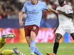 Erling Haaland scores his side's third goal during the group G Champions League match between Sevilla and Manchester City in Seville Erling Haaland scores his side's third goal during the group G Champions League match between Sevilla and Manchester City in Seville