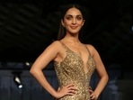 Kiara Advani burns the ramp as showstopper in a deep-neck gold gown for an event in Delhi Kiara Advani burns the ramp as showstopper in a deep-neck gold gown for an event in Delhi 