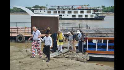 Tourists disembarking from the Raj Mahal (HT Photo) Tourists disembarking from the Raj Mahal (HT Photo)