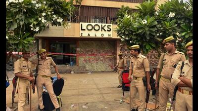 Security personnel outside Levana Suites hotel after it was sealed by Lucknow Development Authority on Wednesday. (PTI Photo) Security personnel outside Levana Suites hotel after it was sealed by Lucknow Development Authority on Wednesday. (PTI Photo)