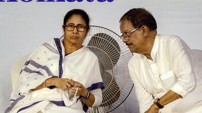 West Bengal law minister Moloy Ghatak, who was raided by CBI on Wednesday, with chief minister Mamata Banerjee at an event in Kolkata in August (PTI File Photo) West Bengal law minister Moloy Ghatak, who was raided by CBI on Wednesday, with chief minister Mamata Banerjee at an event in Kolkata in August (PTI File Photo)