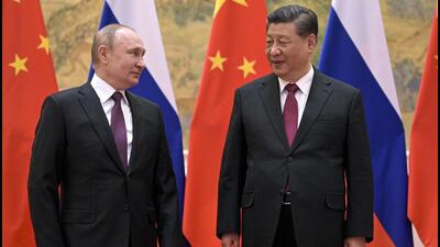 Chinese President Xi Jinping (right) and Russian President Vladimir Putin talk to each other during their meeting in Beijing, on February 4, 2022. (AP) Chinese President Xi Jinping (right) and Russian President Vladimir Putin talk to each other during their meeting in Beijing, on February 4, 2022. (AP)
