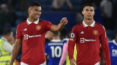 Manchester United's Casemiro, left, and Cristiano Ronaldo leave the pitch after the English Premier League match between Leicester City and Manchester United (AP) Manchester United's Casemiro, left, and Cristiano Ronaldo leave the pitch after the English Premier League match between Leicester City and Manchester United (AP)