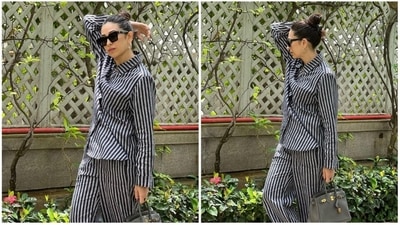 Karisma Kapoor shared a series of pictures of her OOTD as well as a small video flaunting her outfit on her Instagram handle and captioned it, "Stripe it." (Instagram/@therealkarismakapoor)