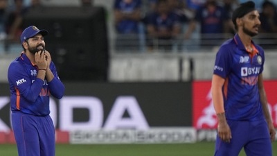 India's captain Rohit Sharma, left, and Arshdeep Singh, right, react as Sri Lankan batters score runs during the T20 cricket match of Asia Cup between Sri Lanka and India in Dubai (AP) India's captain Rohit Sharma, left, and Arshdeep Singh, right, react as Sri Lankan batters score runs during the T20 cricket match of Asia Cup between Sri Lanka and India in Dubai (AP)