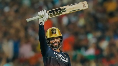 Rajat Patidar of Royal Challengers Bangalore raises his bat after scoring a century (IPL/File Photo) Rajat Patidar of Royal Challengers Bangalore raises his bat after scoring a century (IPL/File Photo)