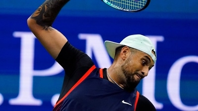 Nick Kyrgios tosses his racket as he plays Karen Khachanov during the quarterfinals of the US Open (AP) Nick Kyrgios tosses his racket as he plays Karen Khachanov during the quarterfinals of the US Open (AP)