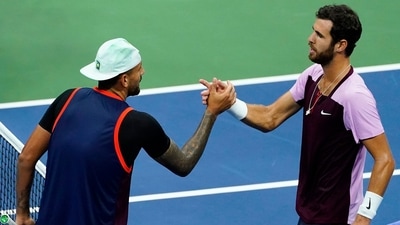 Karen Khachanov, of Russia, right, shakes hands with Nick Kyrgios, of Australia, at the end of a quarterfinal match&nbsp; (AP)