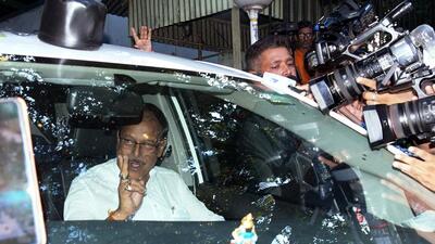 West Bengal law minister Moloy Ghatak leaves his residence after the CBI conducted raids in connection with the alleged coal smuggling case, in Kolkata on Wednesday. (ANI) West Bengal law minister Moloy Ghatak leaves his residence after the CBI conducted raids in connection with the alleged coal smuggling case, in Kolkata on Wednesday. (ANI)