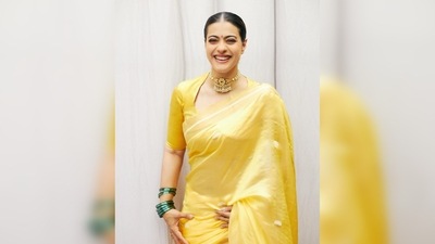 Kajol paired her 6-yards with a matching yellow blouse featuring a plunging neckline and high collar. (Instagram/@kajol) Kajol paired her 6-yards with a matching yellow blouse featuring a plunging neckline and high collar. (Instagram/@kajol)