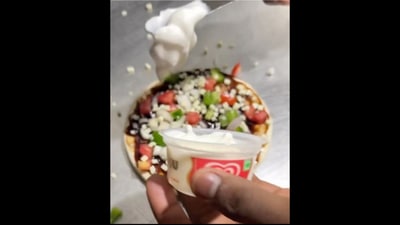 The vegetable pizza gets topped with ice-cream in this video.&nbsp; (Instagram/@radiokarohan)