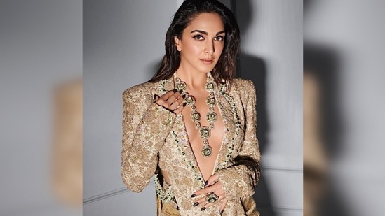 Kiara Advani looked like a million bucks in this ivory embellished blazer with side cut-outs.(Instagram/@kiaraaliaadvani)