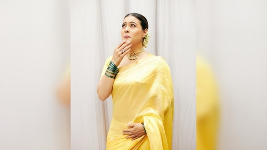 Kajol did not go too heavy with the jewellery. She colour contrasted her yellow saree with green bangles and wore a choker on her neck.(Instagram/@kajol)