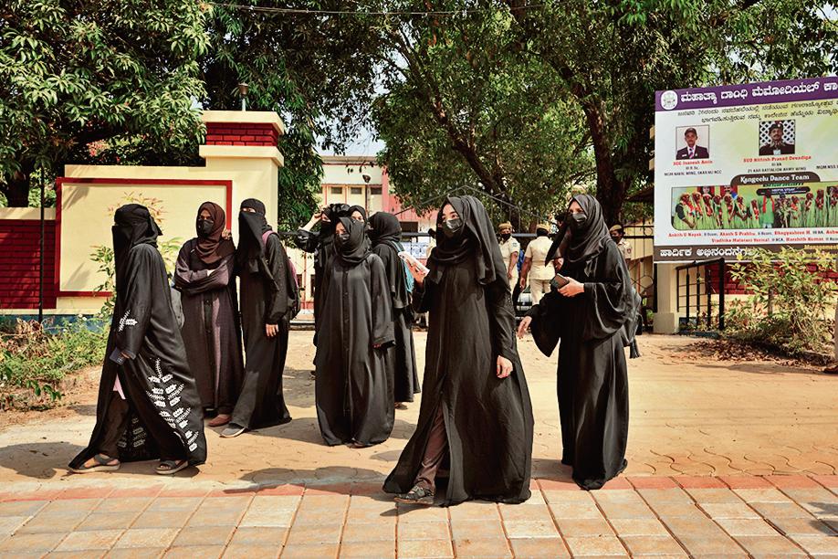 Indian Muslim students wearing burqas leave Mahatma Gandhi Memorial college after they were denied entry into the campus in Udupi, Karnataka state, India, February. 24, 2022. (AP Photo/Aijaz Rahi) Indian Muslim students wearing burqas leave Mahatma Gandhi Memorial college after they were denied entry into the campus in Udupi, Karnataka state, India, February. 24, 2022. (AP Photo/Aijaz Rahi)