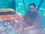 Cyrus Mistry: The photo shows Cyrus Mistry dressed in formals eating the meal. Cyrus Mistry: The photo shows Cyrus Mistry dressed in formals eating the meal.