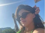 Ananya Panday, in a green bikini, soaks the sun in Italy