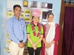 NEET topper Tanishka Yadav with her parents.