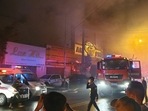 Vietnam Karaoke Bar Fire: Firefighters at the scene of a deadly fire. Vietnam Karaoke Bar Fire: Firefighters at the scene of a deadly fire.