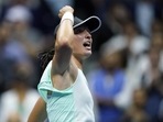 Iga Swiatek, of Poland, celebrates after winning her match against Jessica Pegula, of the United States, during the quarterfinals of the U.S. Open tennis championships.
