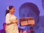 Asha Bhosle and granddaughter Zanai Bhosle during a duet performance. Asha Bhosle and granddaughter Zanai Bhosle during a duet performance.