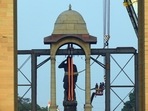 A statue of Subhash Chandra Bose getting installed in the Grand Canopy ahead of the inauguration of the Central Vista Lawns at India Gate in New Delhi, India. (Hindustan Times) A statue of Subhash Chandra Bose getting installed in the Grand Canopy ahead of the inauguration of the Central Vista Lawns at India Gate in New Delhi, India. (Hindustan Times)