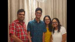 Eeshaan Agarwal with his parents and sister. (Sourced)