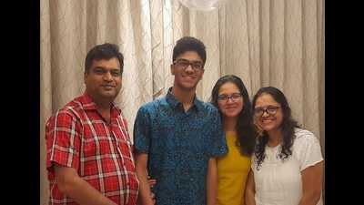 Eeshaan Agarwal with his parents and sister. (Sourced)
