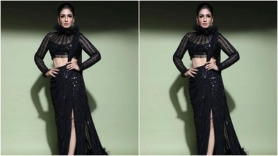 Raveena played muse to fashion designer Manish Malhotra and picked a black stitched saree from the shelves of the designer. (Instagram/@officialraveenatandon)