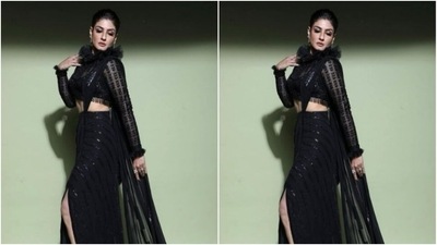 Styled by fashion stylist Surina Kakkar, Raveena wore her tresses into a clean bun as she posed for the pictures. (Instagram/@officialraveenatandon)
