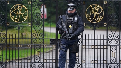 Queen Elizabeth's Health Concerns: An armed police officer stands at the gates to Balmoral in Scotland. (AP) Queen Elizabeth's Health Concerns: An armed police officer stands at the gates to Balmoral in Scotland. (AP)