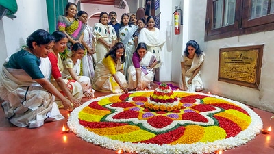 Kerala State Secretariat employees participate in an 'Athapookkalm' competition in Thiruvananthapuram. (PTI) Kerala State Secretariat employees participate in an 'Athapookkalm' competition in Thiruvananthapuram. (PTI)