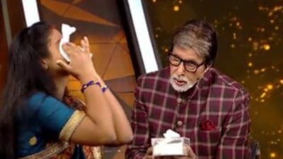 Amitabh Bachchan and Rajani Mishra's still from an upcoming episode of Kaun Banega Crorepati 14. Amitabh Bachchan and Rajani Mishra's still from an upcoming episode of Kaun Banega Crorepati 14.