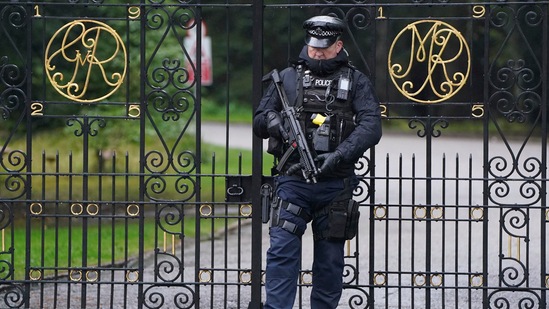 Queen Elizabeth's Health Concerns: An armed police officer stands at the gates to Balmoral in Scotland.(AP) Queen Elizabeth's Health Concerns: An armed police officer stands at the gates to Balmoral in Scotland.(AP)