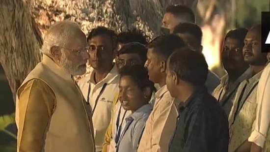 PM Modi interacts with workers involved in Central Vista project.
