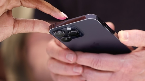 iPhone 14 Pro and iPhone 14 Pro Max have shifted the front-facing camera notch away from the edge and into the display with a design called the 'dynamic island', which is a pill-shaped cutout that houses Face ID, selfie camera and privacy indicators.(AFP)