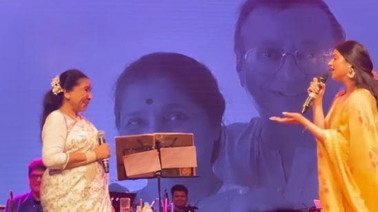 Asha Bhosle and granddaughter Zanai Bhosle during a duet performance.