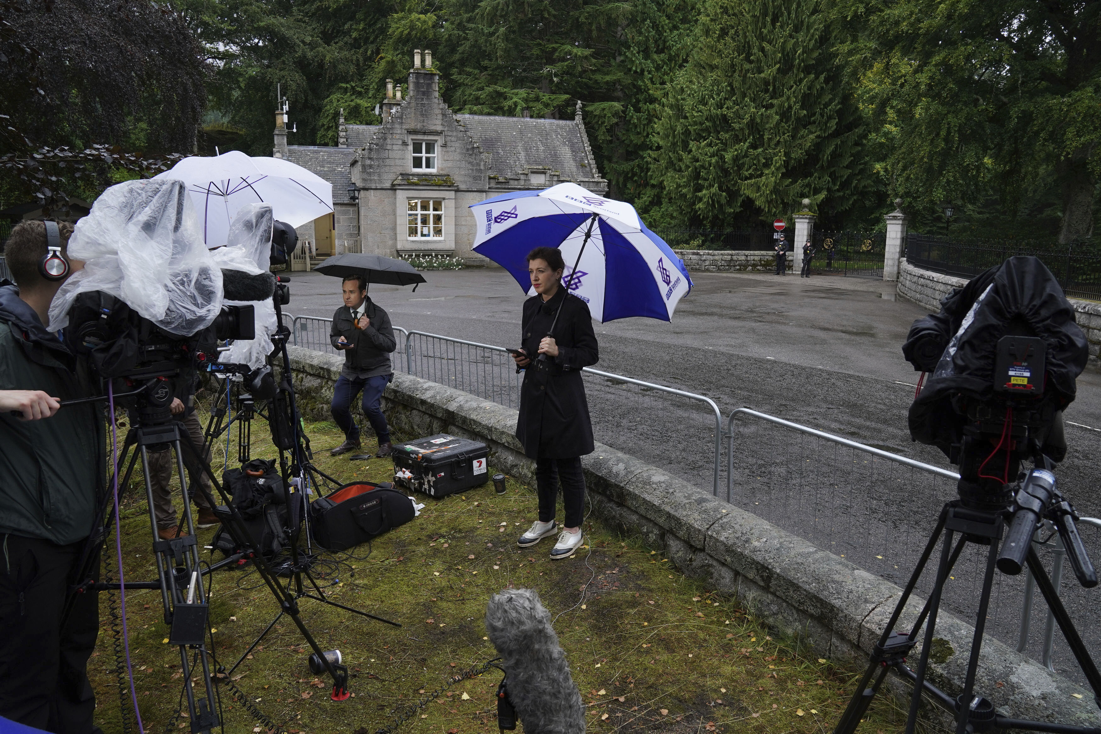 Media gather at the entrance to Balmoral in Scotland. (AP) Media gather at the entrance to Balmoral in Scotland. (AP)