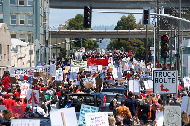 Workers at the Port of Oakland participate in a rally on June 19, 2020, calling for police reform. Thousands marched through the streets of Oakland, past the Police Dept then to City Hall. (Shutterstock) Workers at the Port of Oakland participate in a rally on June 19, 2020, calling for police reform. Thousands marched through the streets of Oakland, past the Police Dept then to City Hall. (Shutterstock)
